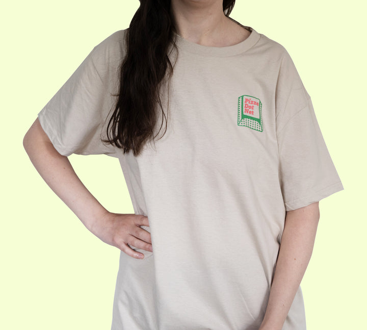 Pizza Dot Net T-Shirt front THE NET warn by girl with brown hair